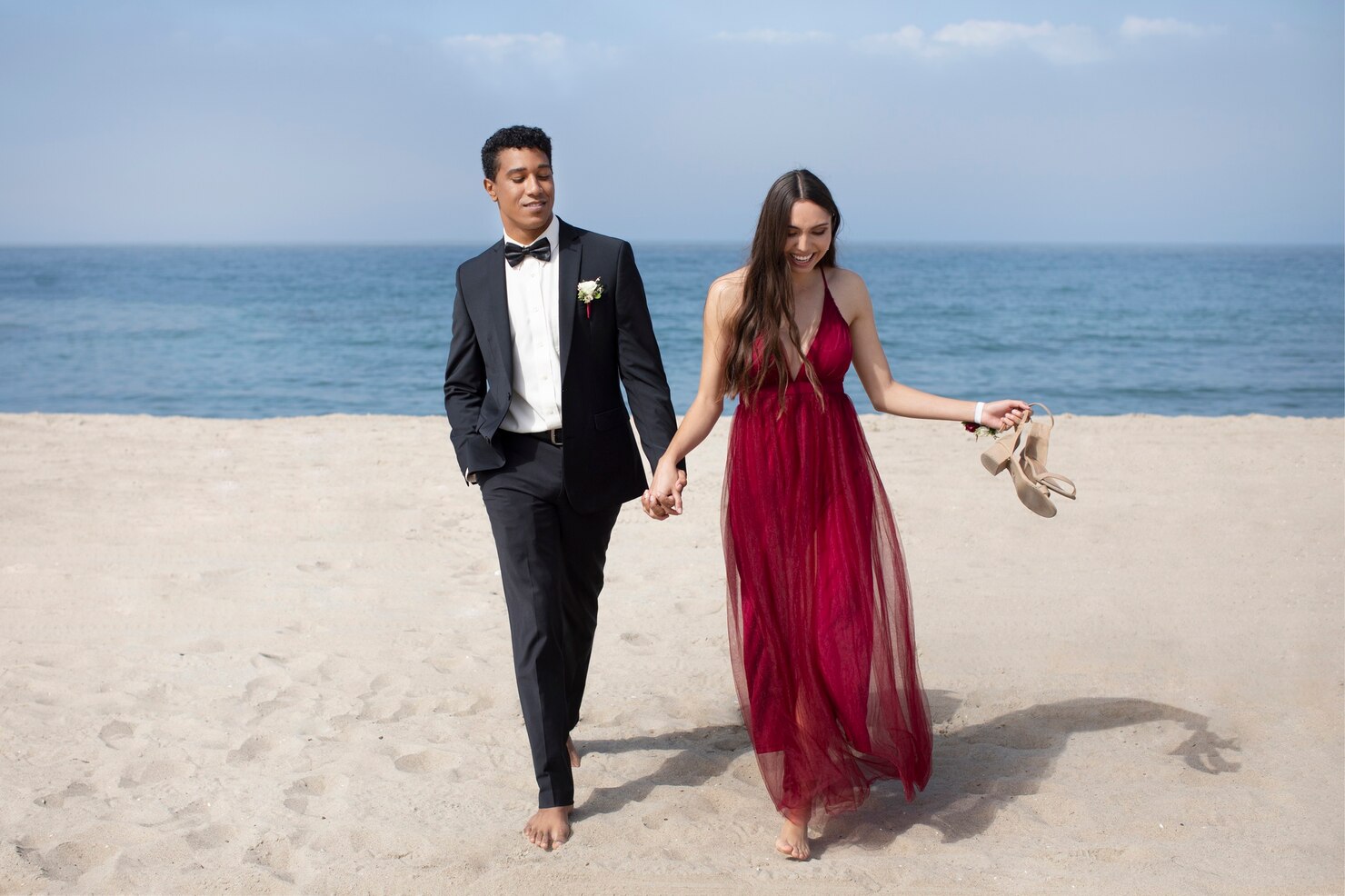 students-prom-clothing-beach_23-2149134327
